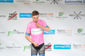 29th of April, 2017; Darragh O’Mahoney, Waterford Racing Club, dons the pink jersey of Race Leader after winning Stage 1 of the AmberGreen Energy Tour of Ulster. Moy, Co. Tyrone. Picture credit: Stephen McMahon / Tour of Ulster