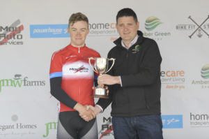 1st of May, 2017; Best-placed Young Rider Overall Darragh O’Mahony, Waterford Racing Club, left, with Garry Nugent, Race Director, on the awards podium at the finish of Stage 3 of the AmberGreen Energy Tour of Ulster. Moy, Co. Tyrone. Picture credit: Stephen McMahon / Tour of Ulster